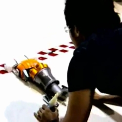 Dyson engineers compete to see who can make the fastest toy car from a Dyson vacuum parts. 