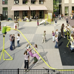 A line of steel invades the yard and buildings to become a school playground and thread architecture.