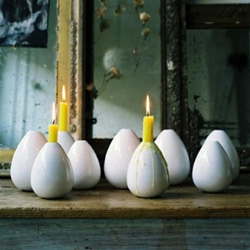 Watch the wax drip like egg yolk with these candle holders by Michelle Mason