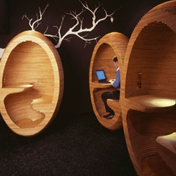 Designed by Emma Selzer , Plus Architecture created ‘laptop pods’ (egg-like pods of stacked laser-cut plywood) for Society, a 242-apartment development in Melbourne’s South Yarra.