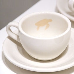 Within 3 series of coffee cups from Esin Arsan that reveal an endangered animal within the cup.