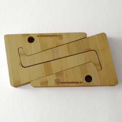 Eveline Pieters designed a clever and functional puzzle shaped laptopstand out of small leftover pieces of bamboo wood.