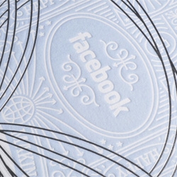 Facebook's Holiday Gift to their top advertisers: An embossed, foil stamped poster, with a wooden token to donate to a charity of choice. [Editor's Note: STUNNING!]