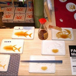 Masaru Iwata's FantaSuteki platters start showing their various designs as soy sauce is added.