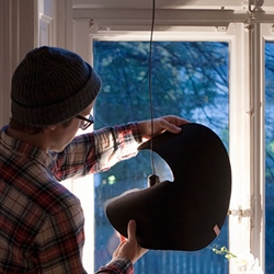 Soft and flexible felt lampshade for the lonely light bulbs created by Swedish designer Maximilian Winkel.