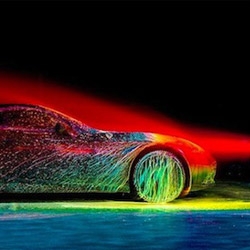 Watch Artist and Photographer Fabian Oefner Cover the 2015 Ferrari California T in Glowing Paint.