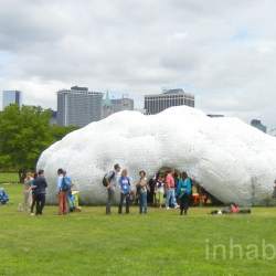 STUDIOKCA's “Head in the Clouds” pavilion made of more than 53,000 reclaimed plastic water bottles popped up on Governors Island this weekend.