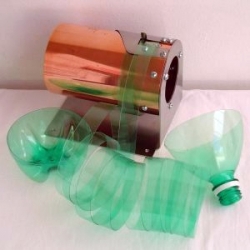 Aiming to reduce the volume of PET bottles carried by "catadores" (people who collect waste from streets), Takashi Utsumi developed a device with which one can rapidly shred PET bottles into ribbons suitable for use in crafts.  I want one.