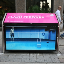 Canada's Magenta Foundation takes recycling bins in downtown Toronto, adds the works of up and coming photographers, and turns them into hot pink public art galleries.