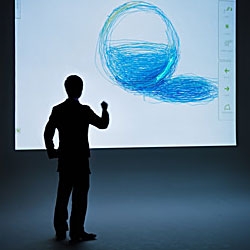 Afterglow is a revolutionary system that creates an interactive environment with a laser pointer on a projection screen.