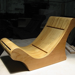 Modern Curve Chair by MOJOWORKIN - made of stacked birch plywood & finished with 5 coats of satin lacquer.  