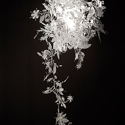 Tord Boontje's classic Garland Light now available in white. 