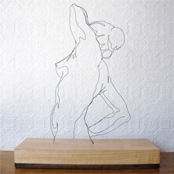 Beautiful wire sculpture and paper cut portraits by Gavin Worth.