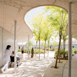 The recently opened Santa Rita Geriatric, by spanish architect Manuel Ocaña. The geriatric is a round bright volume, enclosing a rich inner garden for the guests to enjoy. 