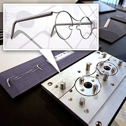 MonoFrame Glasses by Parsha Gerayesh of RCA’s Design Products are glasses whose frame is formed from a single material. They borrow techniques from spring manufacturing.