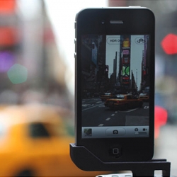 The GLIF by Tom Gerhardt and Dan Provost, is a simple iPhone 4 accessory with two primary functions: mounting your iPhone to a standard tripod, and acting as a kickstand to prop your phone up at an angle.