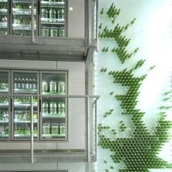 What do you do when Heineken asks you to design their first shop? Do you place furniture and displays into a given space? Or you pour furniture into a building in the heart of Amsterdam, as if we were filling a cold fresh glass of X-tra cold Heineken?