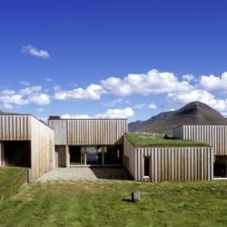 The beautiful green-roofed Hof Country Residence is located in the Skakafjördur Fjord of Iceland, less than 100km from the Arctic Circle. Designed by Studio Granda Architects. Just look at that countryside!