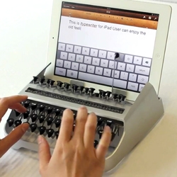 iTypewriter by Austin Yang allows you to type on your iPad with a typewriter that has been specifically designed for the size and screen. A little slow, but still cool. 