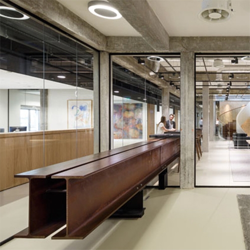 Great use of a huge I-beam as decor/table base by Fokkema & Partners Architecten for the former Dutch Bank building in Rotterdam, The Netherlands.