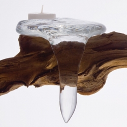 Icicle-shaped votive candleholder that hangs elegantly over the edge of a table, mantle or shelf.