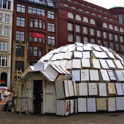 At Hamburg Gaensemarkt an artist built an Igloo from 322 old fridges to raise his voice against waste of energy.