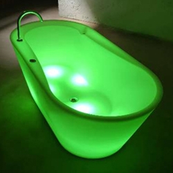 An  addition to the  "bathtub as functional art"  theme:  the illuminated bathtub, designed by Jan Puylaert.