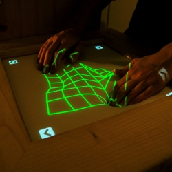 The Impress foam touchscreen by Dis.play invites interaction between the human body and computer displays.  It transforms an emotionally frigid object into something inviting and tactile.