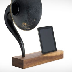 Love the mix of old and new. The iVictrola is an iPad stand/speaker that merges your iPad with an antique Magnavox phonograph horn with two pieces of American walnut.