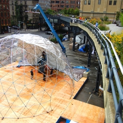 Free ice skating at Jaguar's giant snow globe that just popped up under the High Line today.