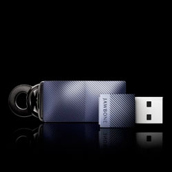Jawbone ICON HD + THE NERD (a Wire-Free USB Audio Adapter) offers a handsfree solution that can simultaneously connect to two devices.