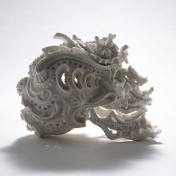 A series of intricate porcelain skulls by Katsuyo Aoki.