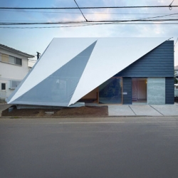 Suppose Design Office designed the 'House in Kodaira' that dilute the limits between interior & exterior with a tent structure covering a garden from the street view.