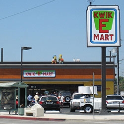 A Kwik-E-Mart was set up for The Simpsons movie promotion and opened yesterday. It's located in Burbank (California) at the corner of Olive & Verdugo in the 91505. [This one takes you to the flickr group]