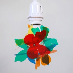 MOTH, a highly customizable colourful lamp that takes the shape of any energy saving bulb as its own; the buyer decides 