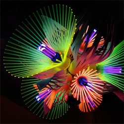 Blooming Spark I Chandelier by Hsiao-Chi Tsai and Kimiya Yoshikawa created exclusively for Vessel gallery. A beautiful mix of materials and colors with UV/incandescent lighting.