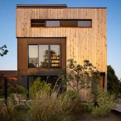 Chadbourne + Doss Architects have designed the Lobster Boat Residence, a 2380 square foot home on Portage Bay in Seattle, Washington.