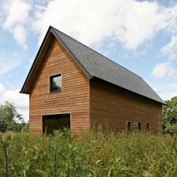 This cabin in Normandy by Lode Architects looks ordinary enough from the outside, but the inside is something else.