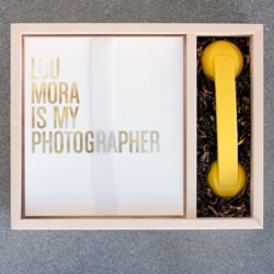 Los Angeles based advertising photographer Lou Mora created a promo piece that incorporates a custom made wooden box, fine art prints, and a Native Union phone.