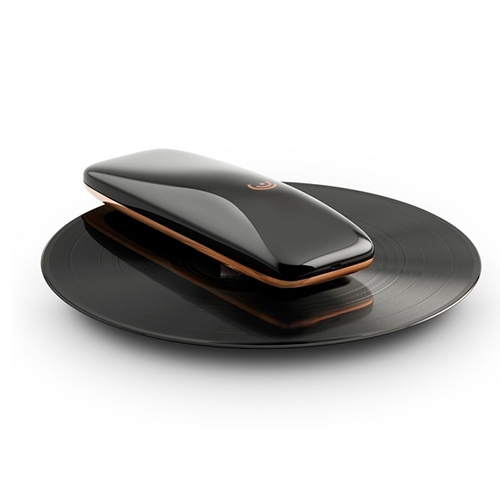 LOVE - The World's First Intelligent Turntable "maintains the intimacy and quality of vinyl records but adds modern day smart features, while keeping the crackles & pops." Designed by Yves Behar. Currently on Kickstarter.