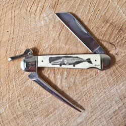 CXXVI's Marlin Spike Knife letter opener with beautiful scrimshaw detailing of a sperm whale.