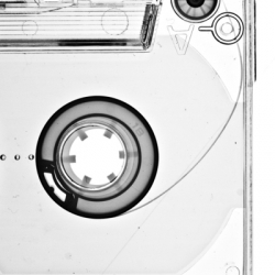 Photographer Martin Senyszak of Edinburgh, Scotland analyzes the visual structure of the common cassette tape. His simple black and white images break down the tape into its component parts.