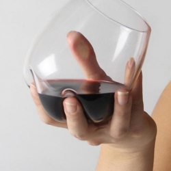 Meld Wine Glass inspired by the interaction between glass and hand, merges them to create delicate interactive glass objects, from muzzdesign.