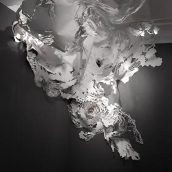 Mia Pearlman's Voluta is a limited edition laser cut sculpture made of translucent high impact polystyrene. Fun and easy to construct, it offers art lovers of all ages the opportunity to create and own a complex, luminous “paper” sculpture.