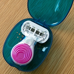 Gillette Venus Snap Razor - intriguing product design + packaging for this mini Razor handle and clamshell case.