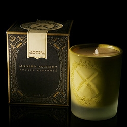 Modern Alchemy candles by D.L.&Co.  "Tincture of Winchester", pictured,  combines "a fire of wood stock, 19th century lacquer, and smoky gunpowder." Love the etched glass and packaging too.