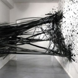Berlin-based artist Monika Grzymala has created this dramatic installation using black tape at the the Sumarria Lunn gallery in London.