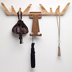 Pur Norsk Cato - Moose Coat Hanger in various woods and black or white. 