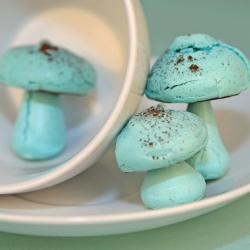 Laurel Avenue Bakery is selling Down The Rabbit Hole curio boxes filled with delicious cakes, such as these blue meringue mushrooms, in honor of the Alice In Wonderland movie release.