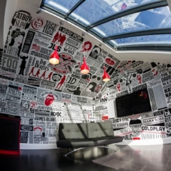 Graphic designer Alex Fowkes works his mural magic once again, paying typographic tribute to a host of musicians at the home of pop star Olly Murs. 